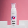 Schiuma sbiancante Diamond Smile su sfondo rosa