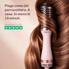 Spazzola ovale in titanio con distribuzione uniforme del calore per uno styling delicato e capelli luminosi.